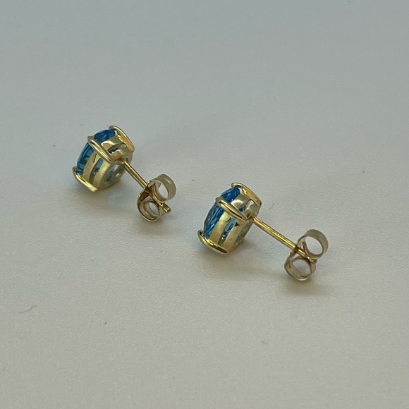 Solid 14K Yellow Gold Oval Swiss Blue Topaz Stud Earrings - Picture 3 of 4